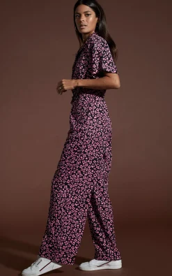 Women Dancing Leopard Zeta Jumpsuit In Pink On Black Leopard
